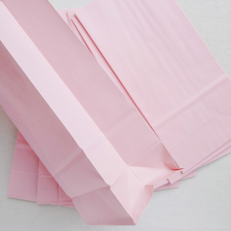Pack x 10 bolsitas de papel con fuelle color rosa
